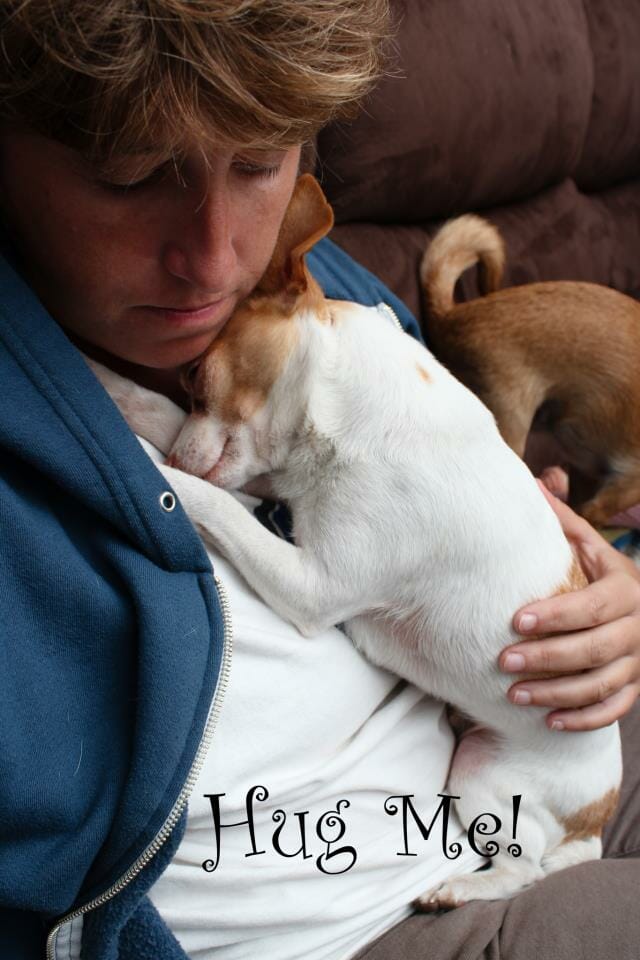 Trish of Pawesome Pet Photography and CCRT hugging her rescue chihuahua