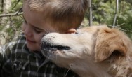 Smiley and Boy hug