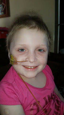 Little girl Katlyn in hospital smiling