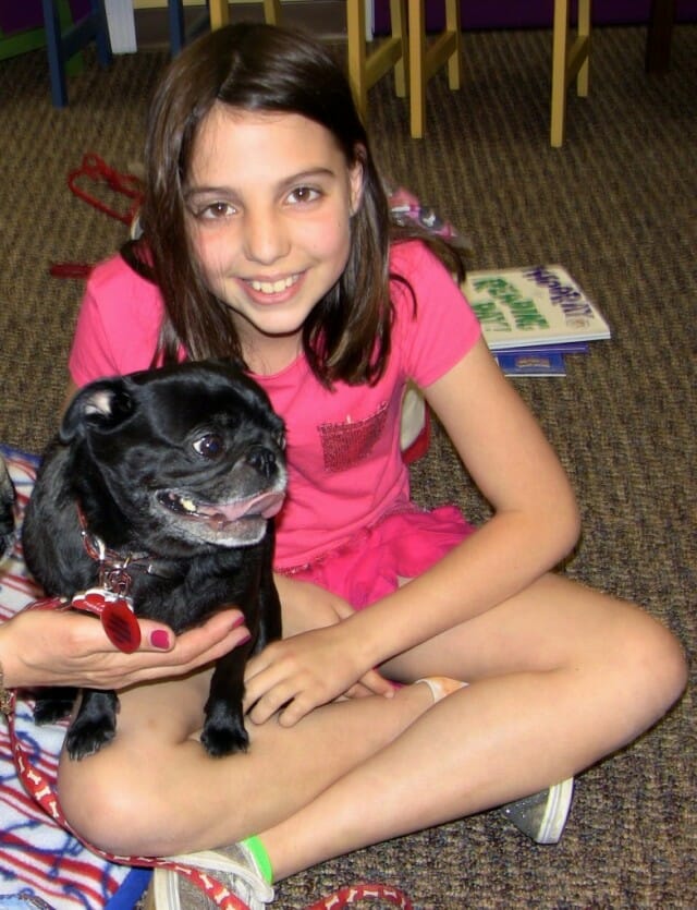 Therapy Pug & Sarah reading together