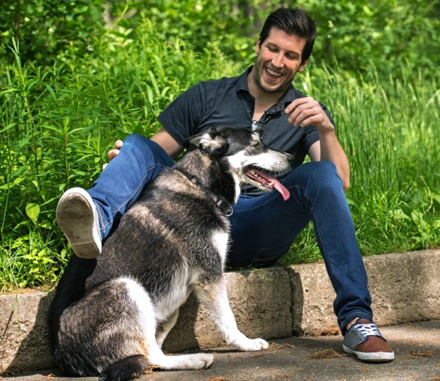 Brad Smith laughing with Laika