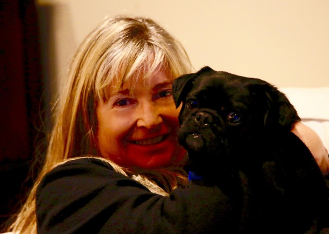 Kilo the Pug and Talent Hounds Producer Susie Nation hugging