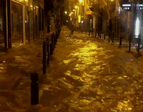 Cannes street from restaurant during storm