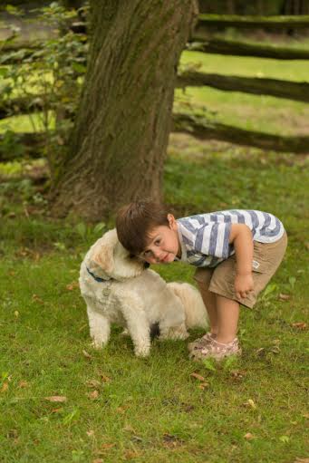 Henry kisses little boy