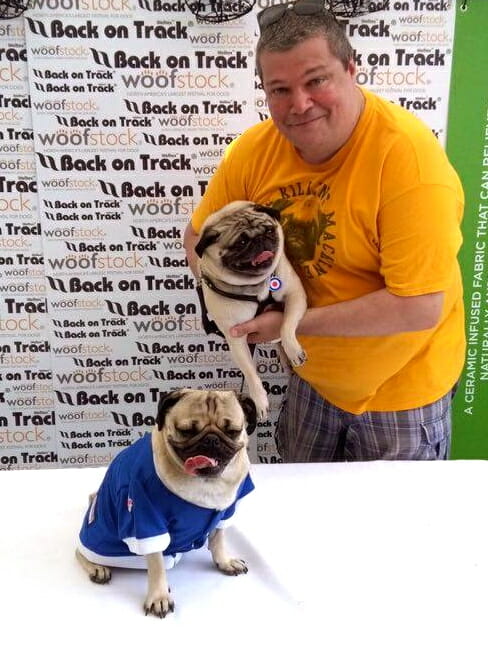 Doug the Pug and Fishstick the Pug at Woofstock