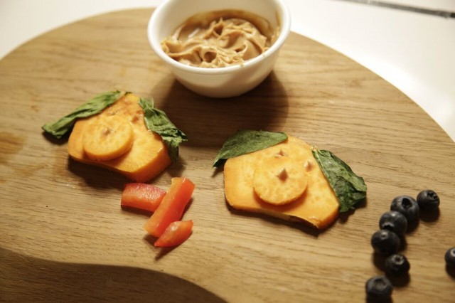 decorating-our-dog-licks-sweet-potato-pups-with-red-pepper-and-blueberries