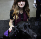 Kids' Pet Club Reporter Jocelyn and NSD Iggy from Boost in an interview at Canadian Pet Expo.
