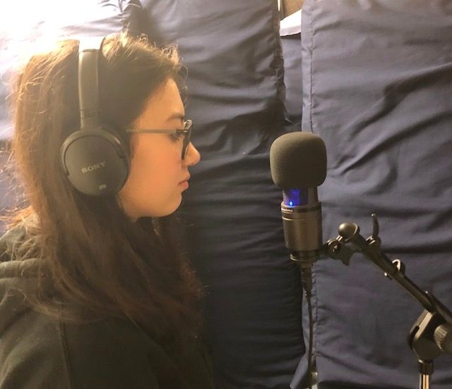 Behind the scenes picture of Aiko recording the song Forever for rescues