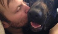 Valentines Contest Photo man kissing dog