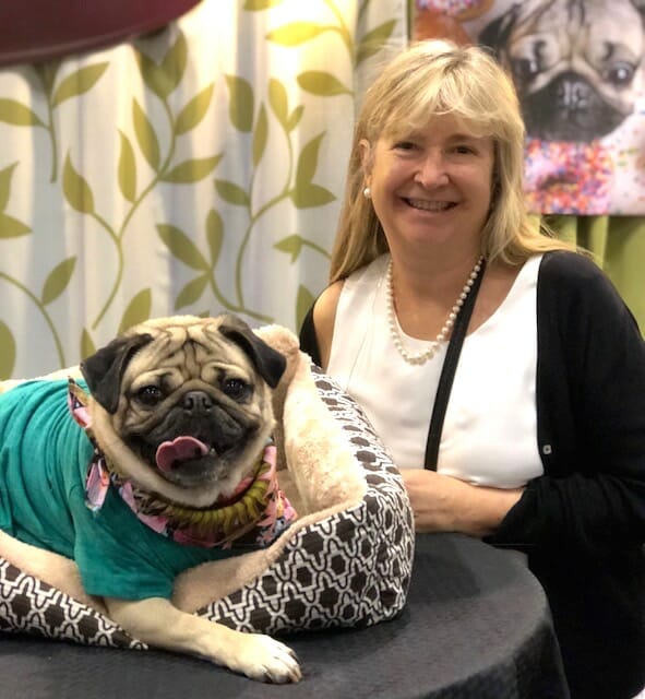 Susie and Doug the Pug smiling at Global Pet Expo 2018