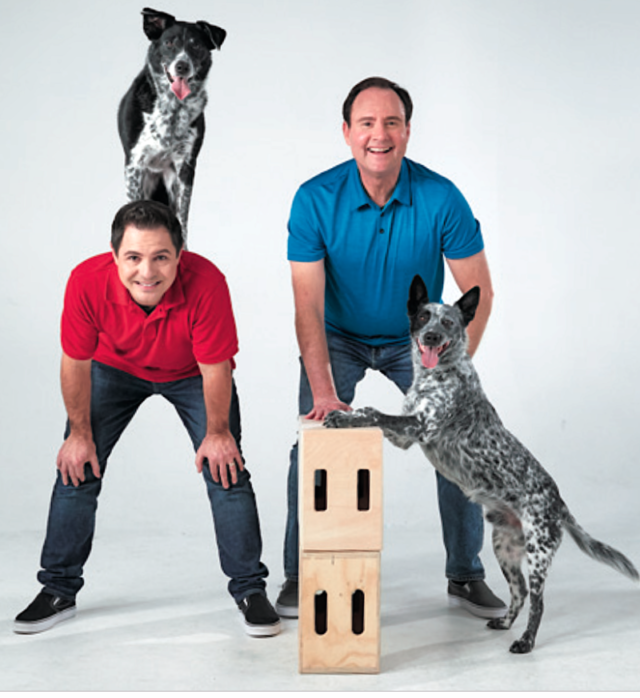Authors of The Big Book Of Tricks for the Best Dog Ever Chris Perondi and Lary Kay with their dogs.